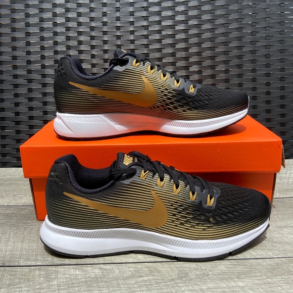 nike pegasus 34 black gold